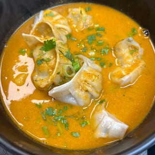 Veg jhol (soup) momo